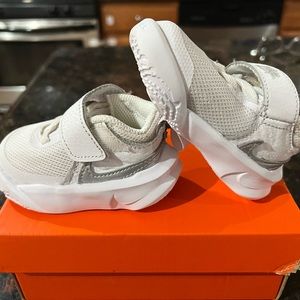 white Nike Team Hustle D 10